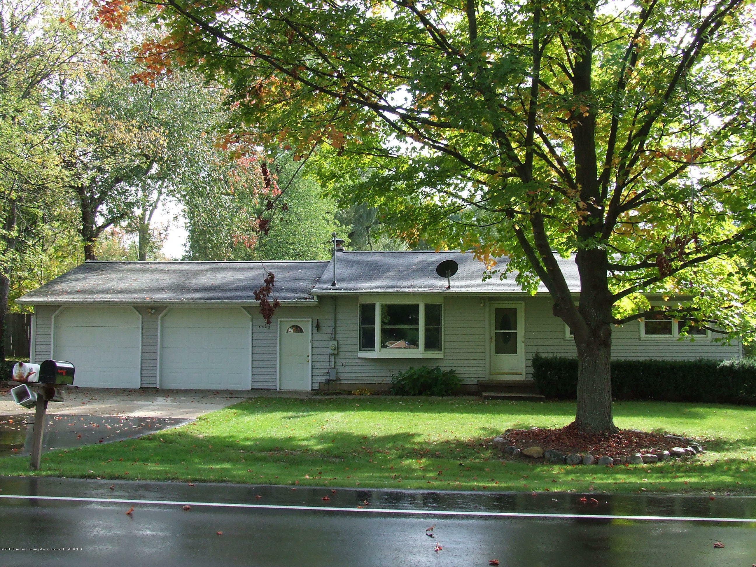 Property Photo:  4043 Dell Road  MI 48911 