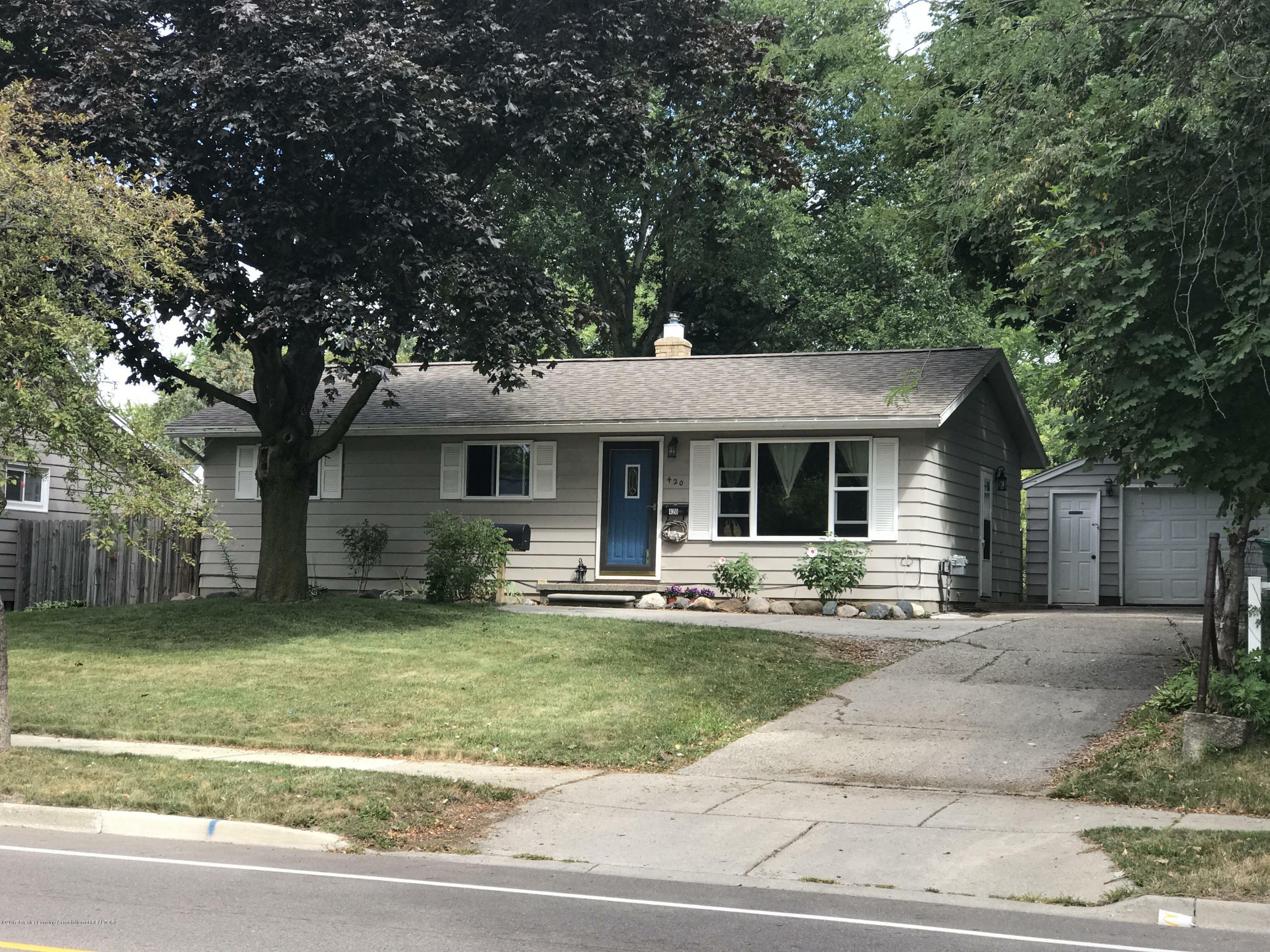 Property Photo: 420 W Holmes Road MI 48910