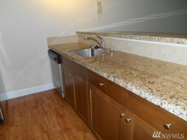 Property Photo:  300 N 130th St 7109  WA 98133 