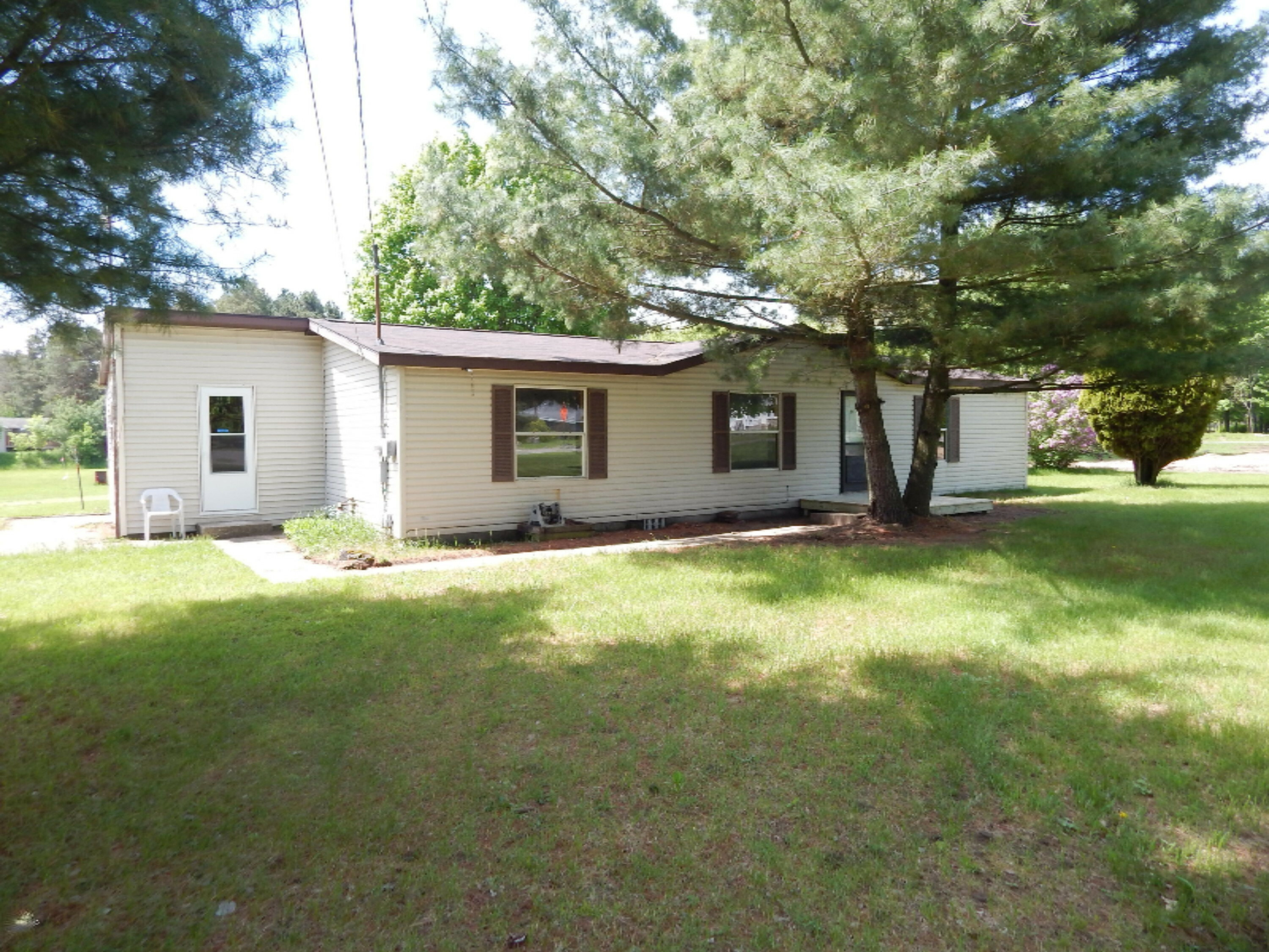 Property Photo:  4270 13 Mile Road NE  MI 49341 