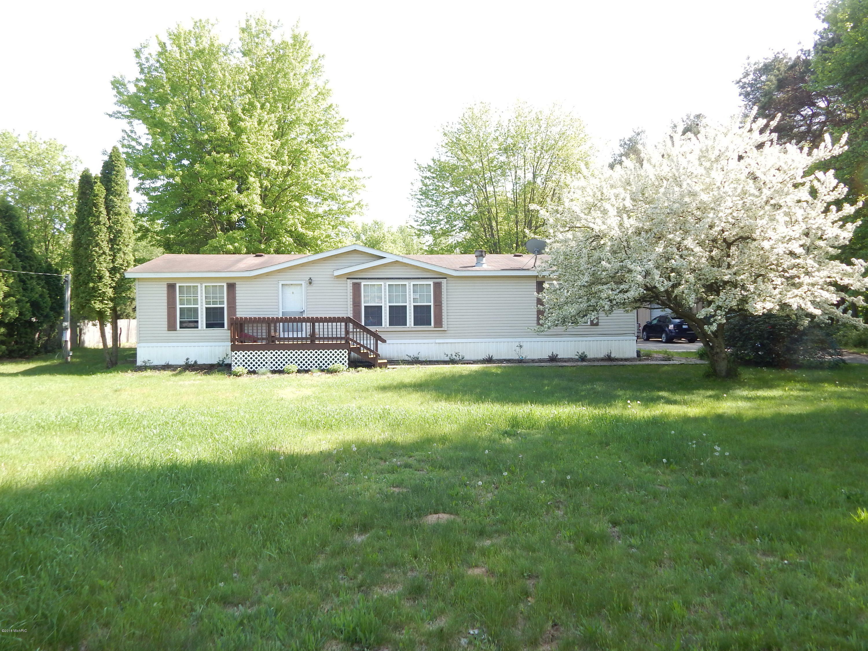 Property Photo:  1250 22 Mile Road NW  MI 49330 