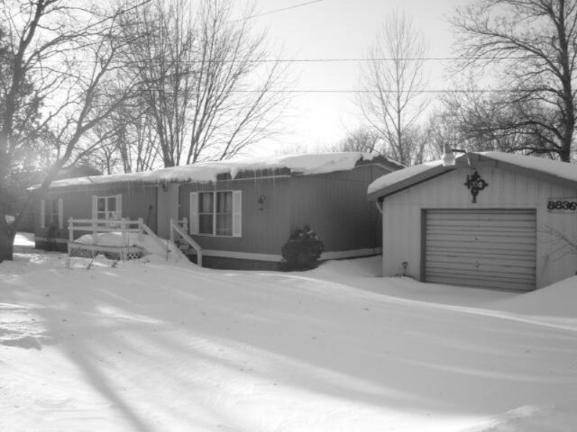 Property Photo:  8836 River Road  MI 49631 