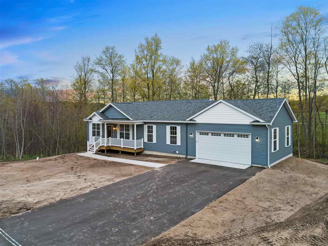 Property Photo:  956 Windsong Place Lot 47  MI 49770 