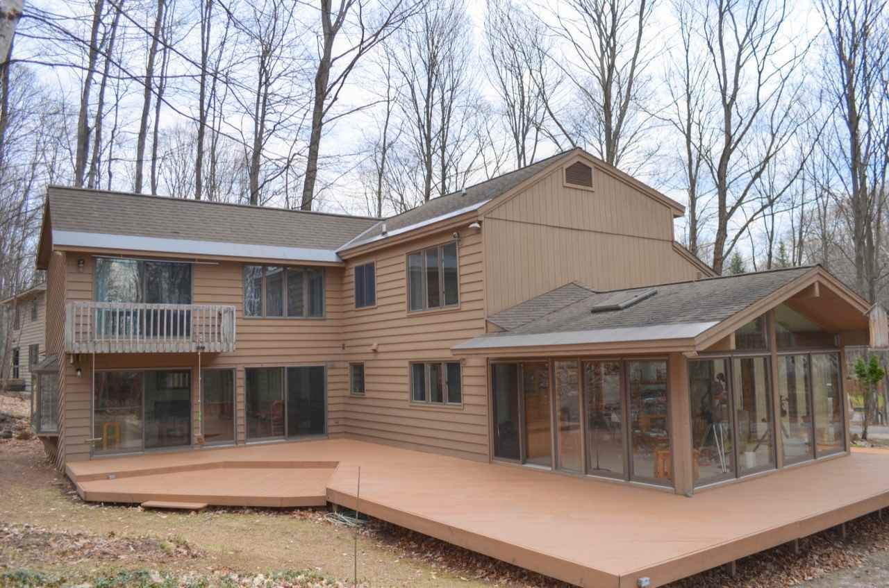 Property Photo:  8292 Woodloft  MI 49740 