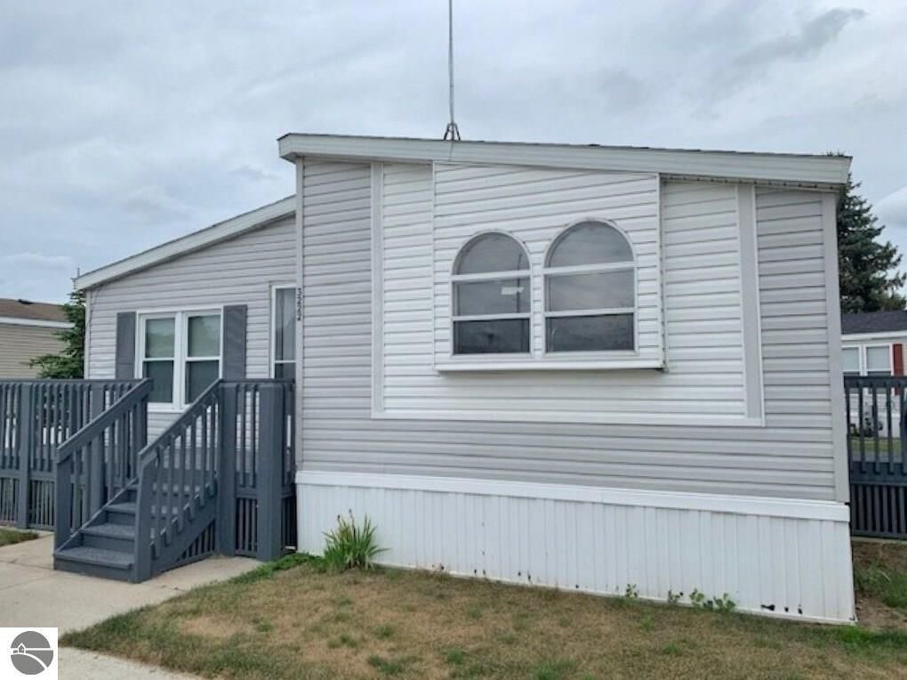 Property Photo:  3222 Pipes Circle  MI 48801 