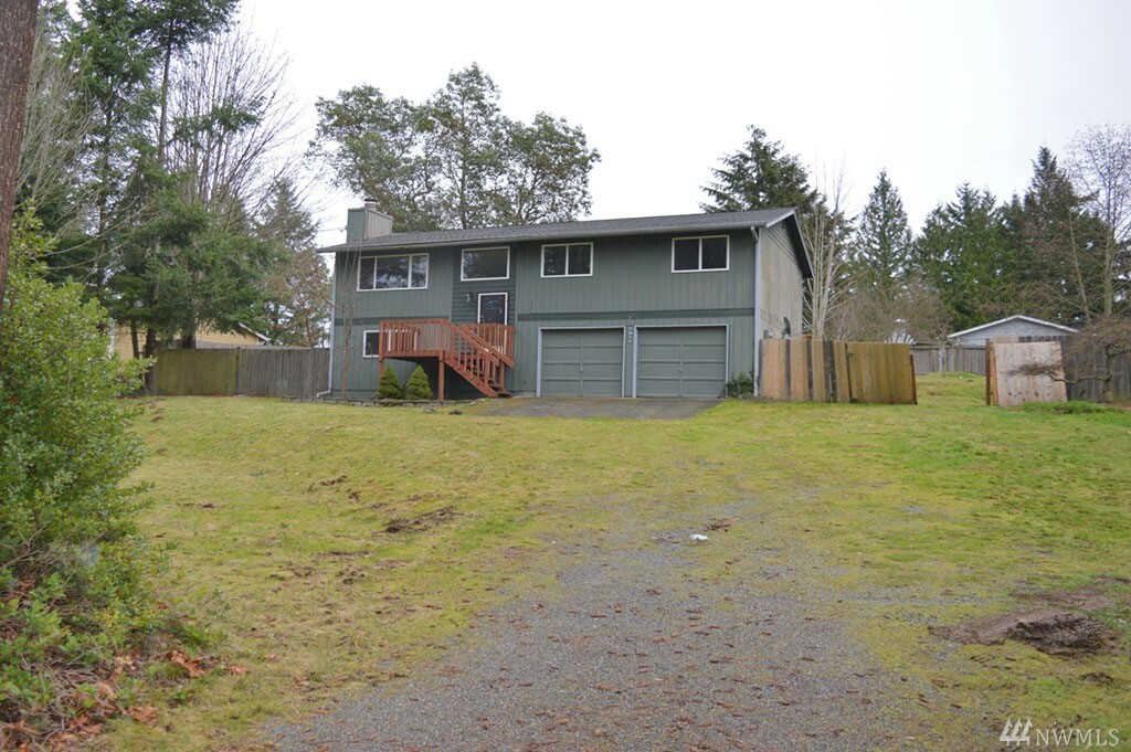 Property Photo:  7014 Locust Ave E  WA 98391 