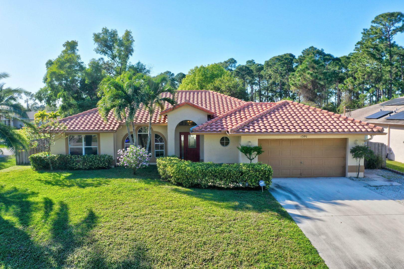 Property Photo:  1597 SW Flagami Road  FL 34953 