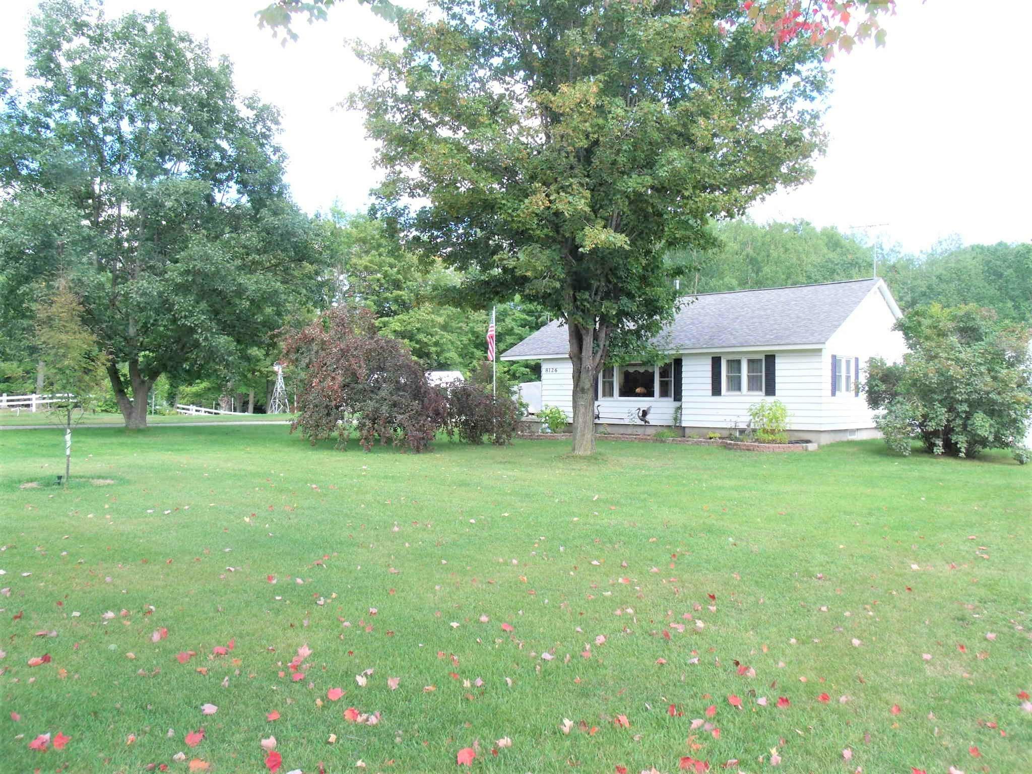 Property Photo:  8126 Mullett Lake Road  MI 49721 