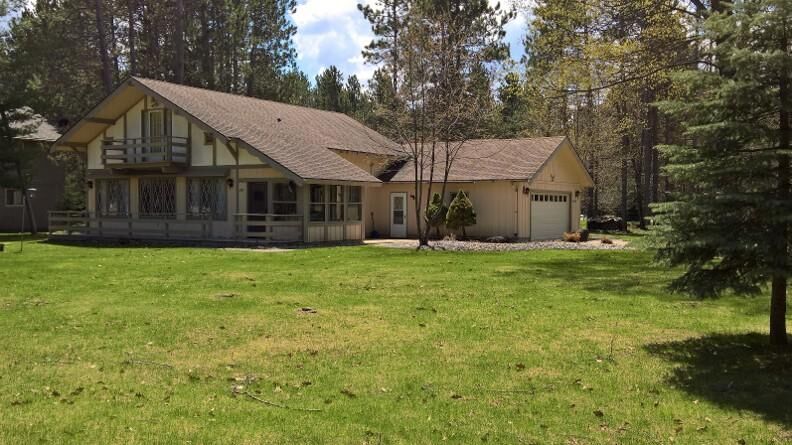 Property Photo:  6744 St Andrews Drive  MI 49735 