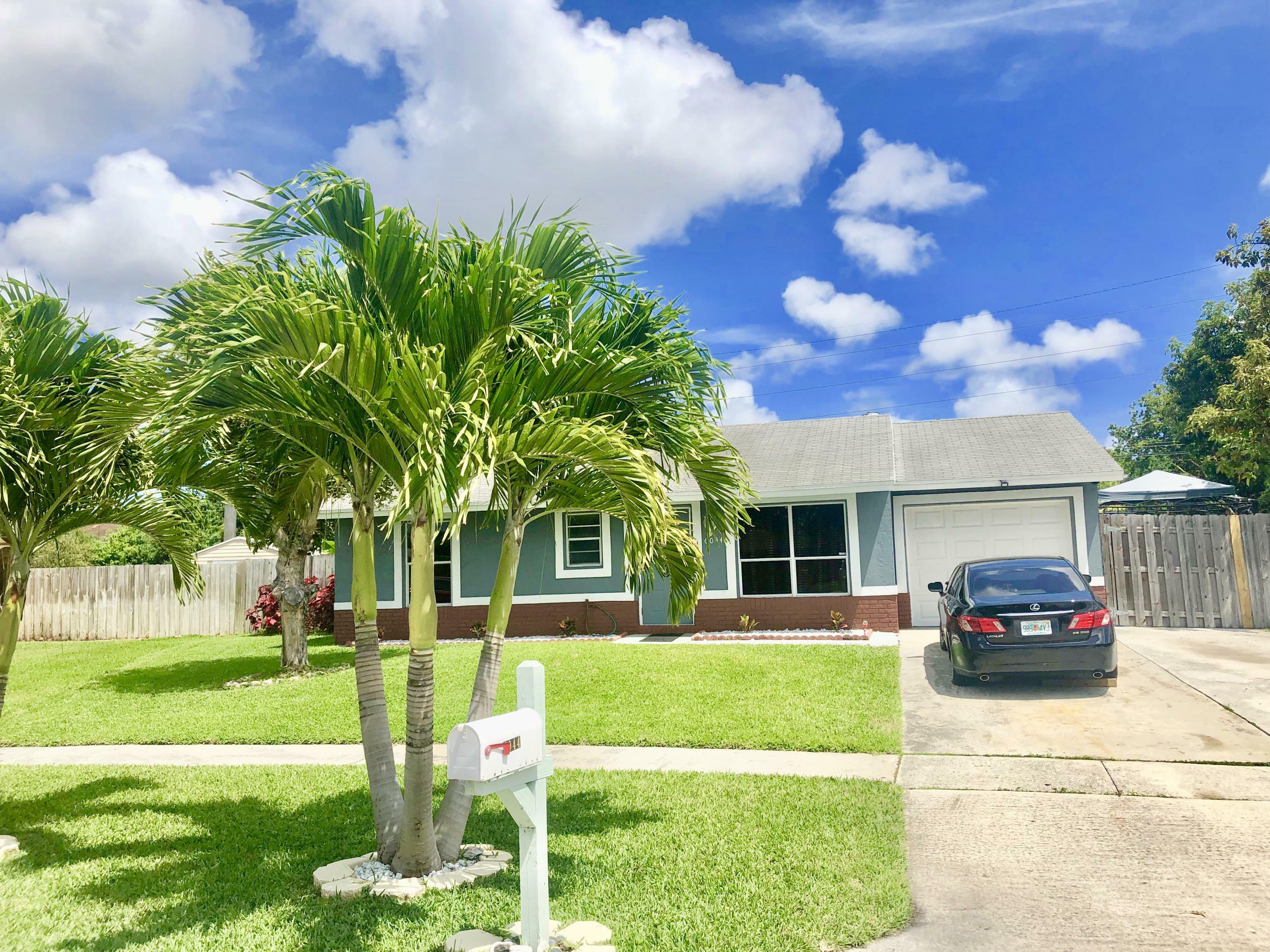 Property Photo:  6044 Carthage Circle N  FL 33463 