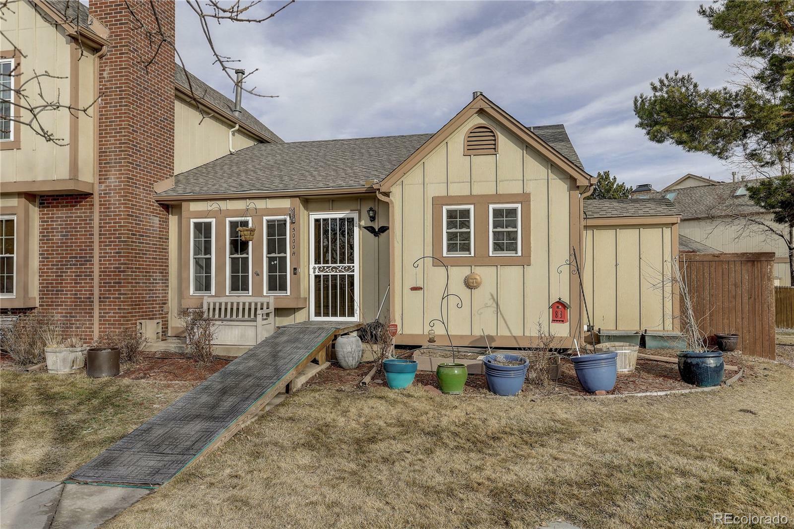 Property Photo:  5000 S Pagosa Street H  CO 80015 