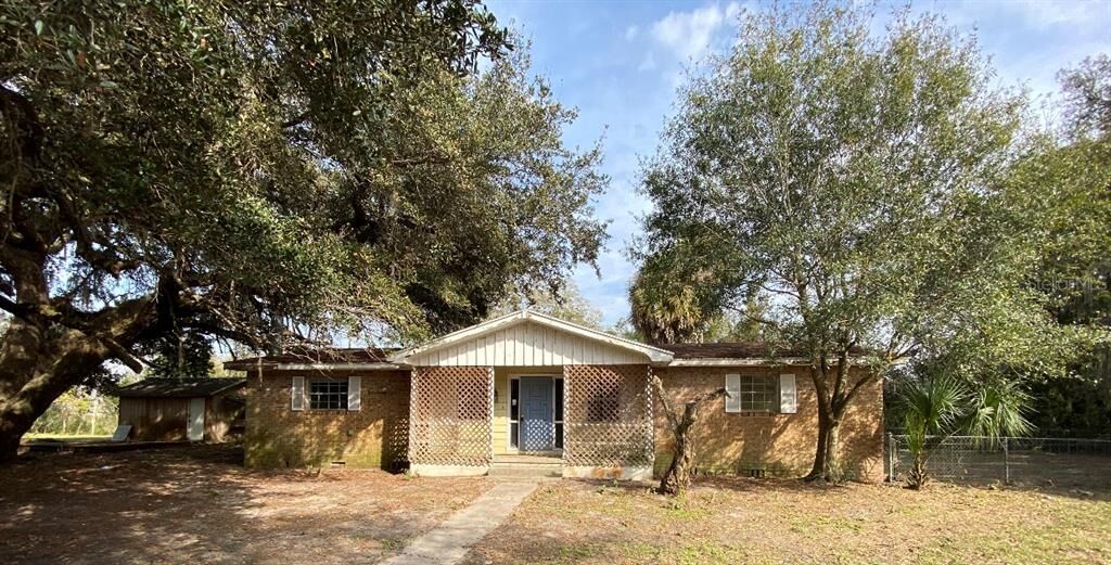Property Photo:  704 Flatwoods Road  FL 34748 