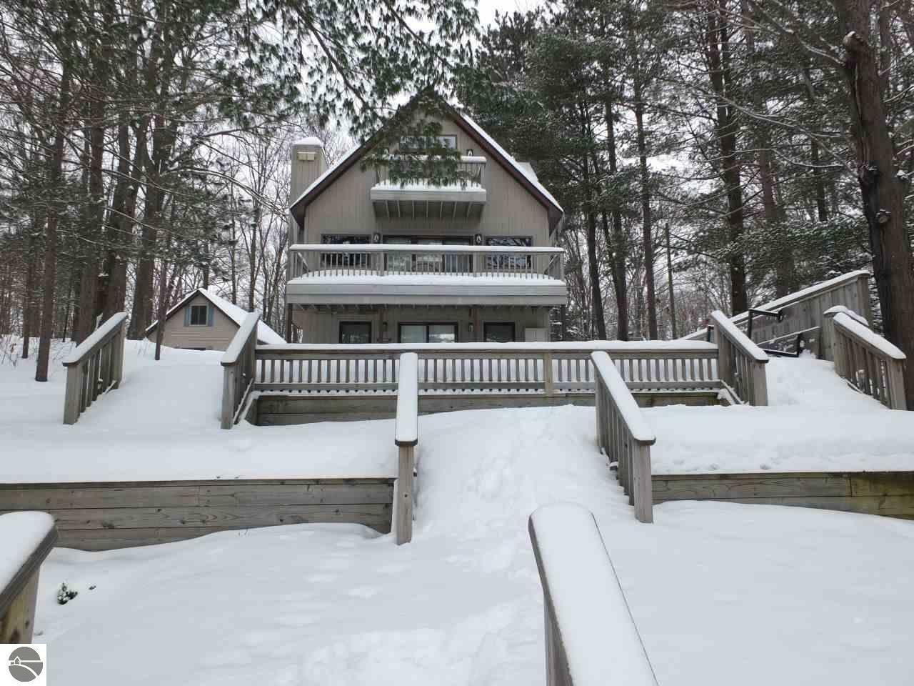 Property Photo:  8918 Sunset Trail, NE  MI 49659 