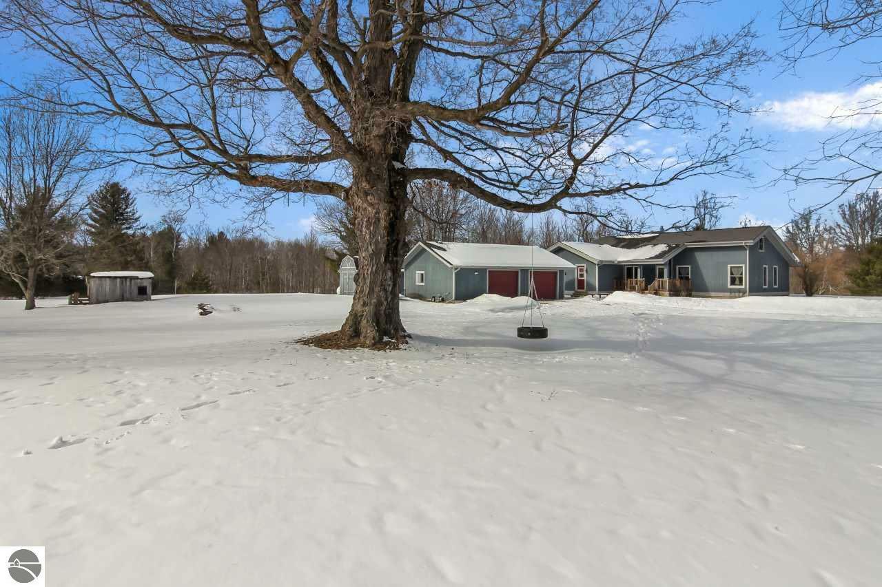 Property Photo:  6064 Gleaner Hall Road  MI 49649 