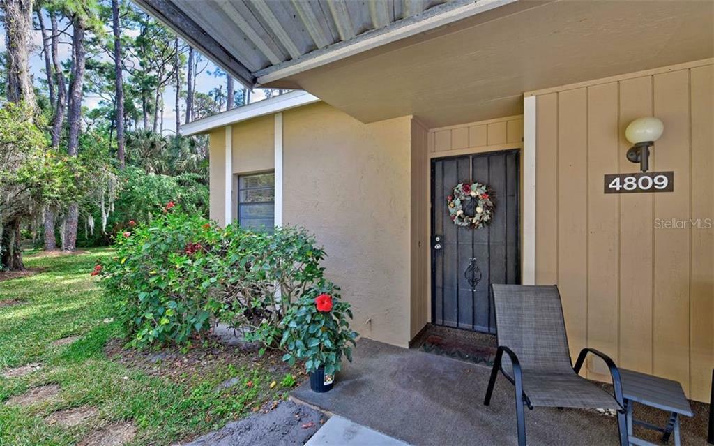 Property Photo:  4809 Village Gardens Drive 105  FL 34234 