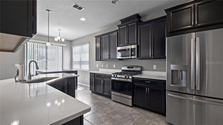Property Photo:  831 Zeek Ridge Court  FL 34715 