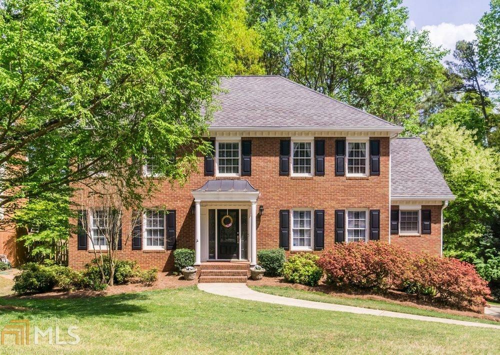 Property Photo: 10825 Tuxford Dr GA 30022
