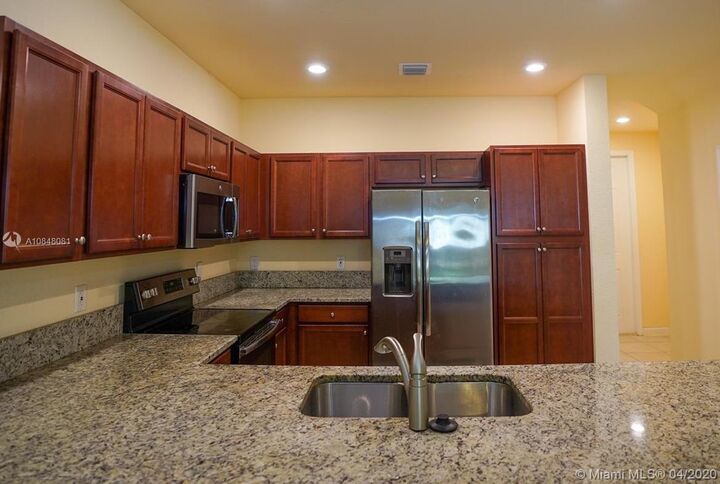 Property Photo:  5883 NW 56th Pl  FL 33319 