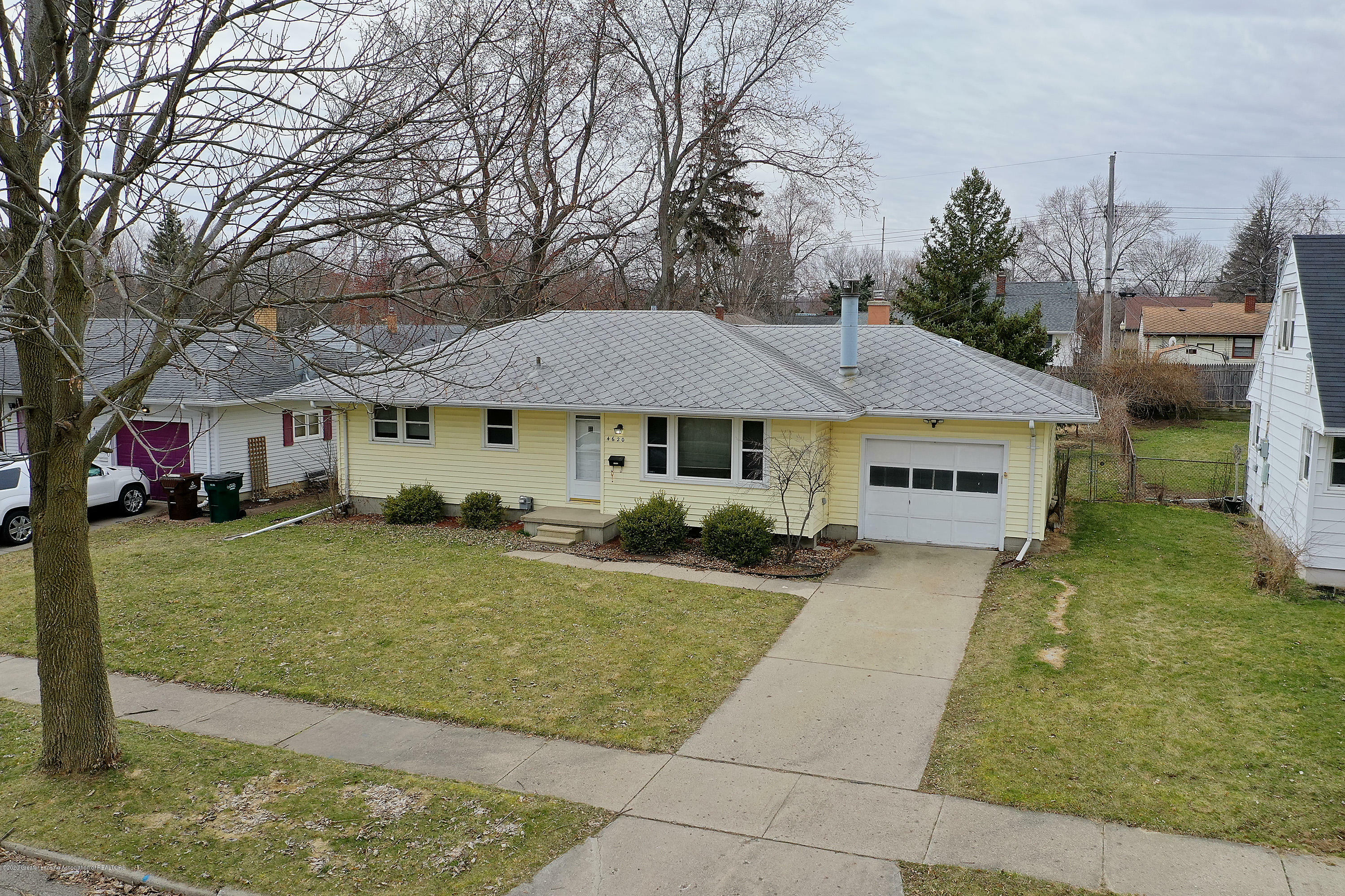 Property Photo:  4620 Devonshire Avenue  MI 48910 