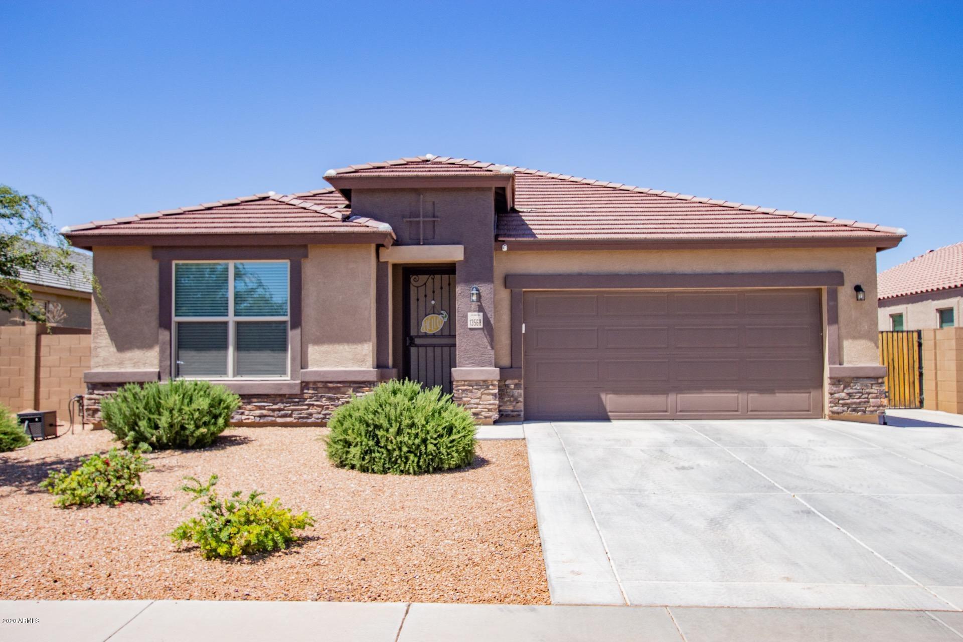 Property Photo:  13568 W Desert Moon Way  AZ 85383 