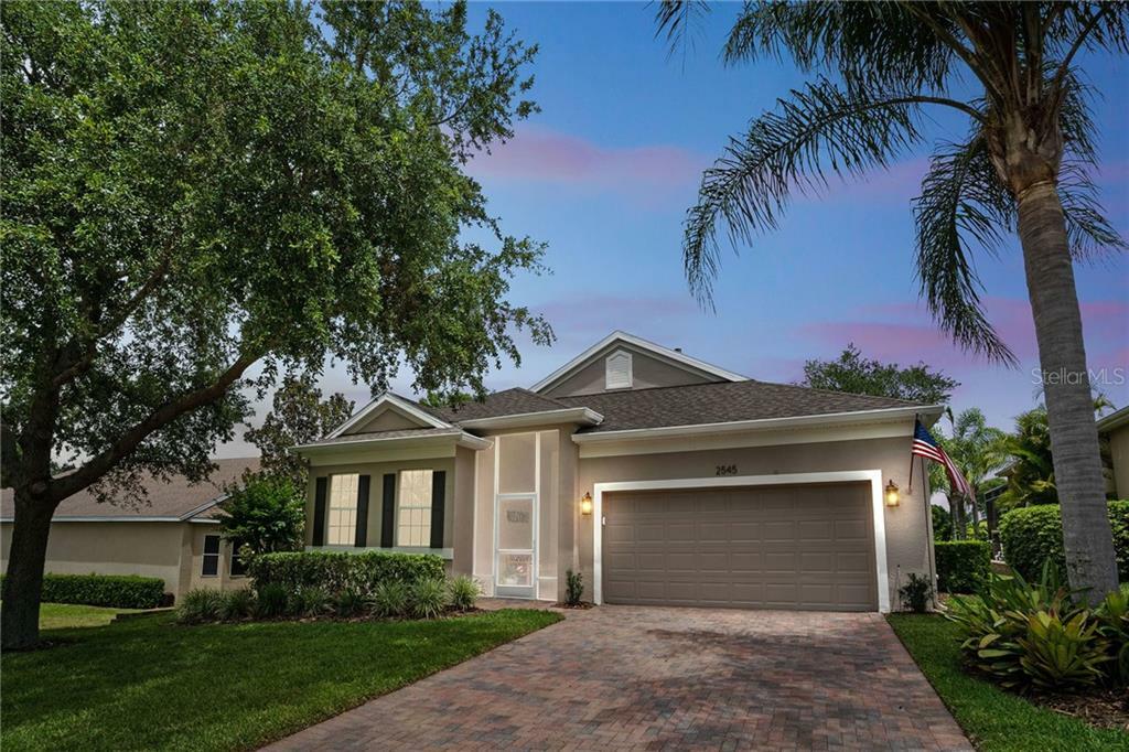 Property Photo:  2545 Castle Pines Street  FL 34711 