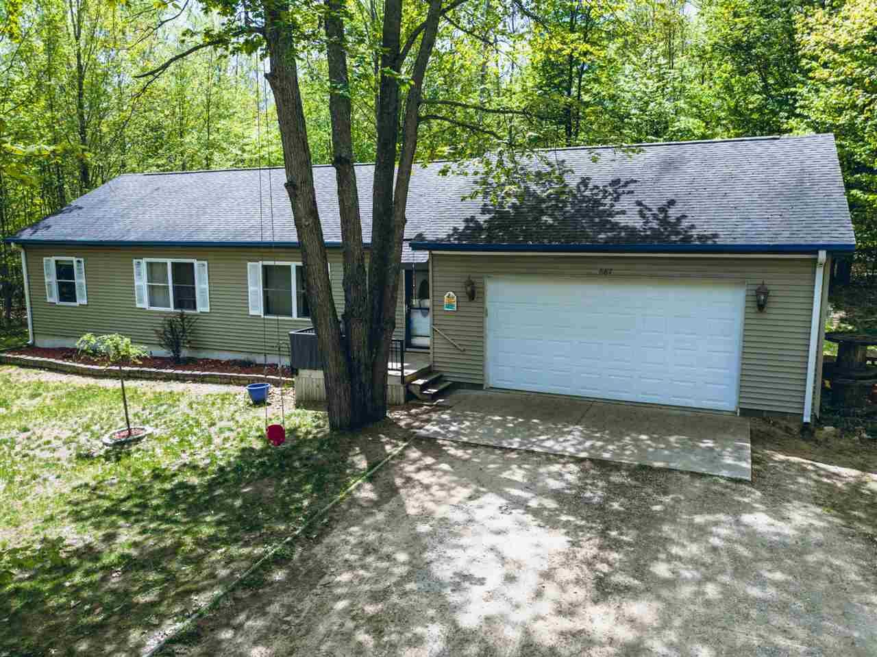 Property Photo:  887 Michaywe  MI 49735 