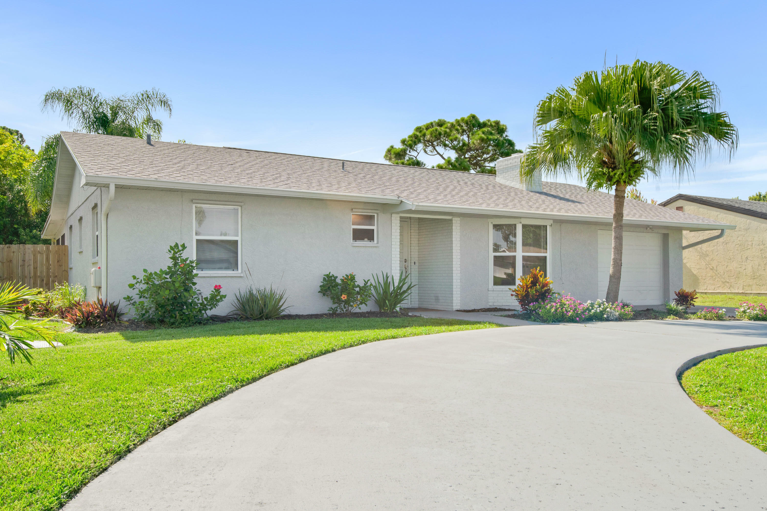 Property Photo:  2157 SE Floresta Drive  FL 34984 