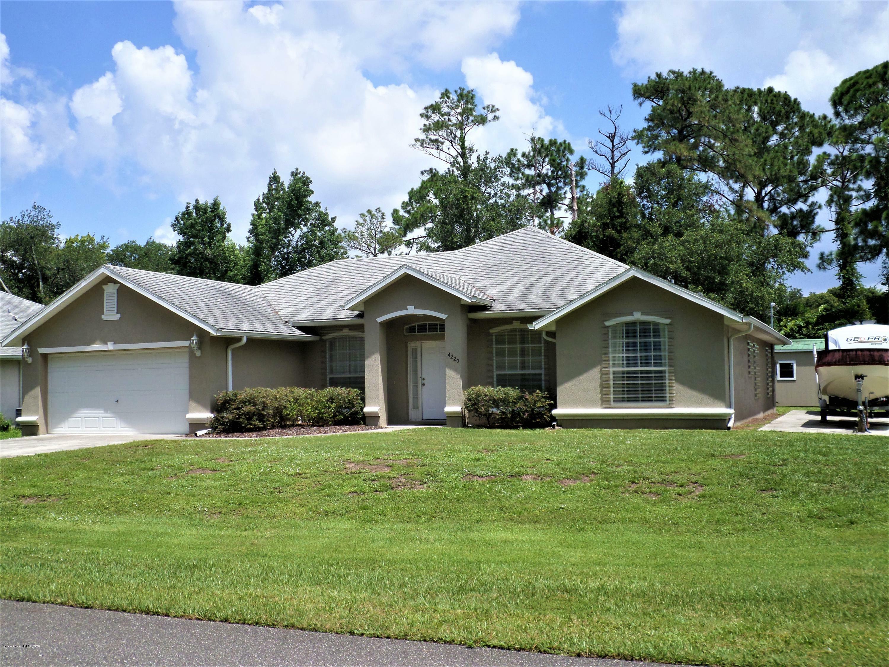 Property Photo:  4220 Skyway Drive  FL 32927 