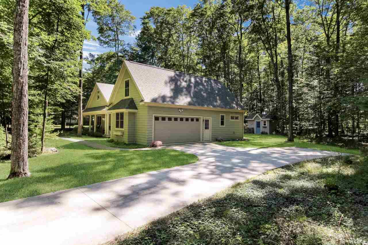 Property Photo:  12434 Country Club  MI 49720