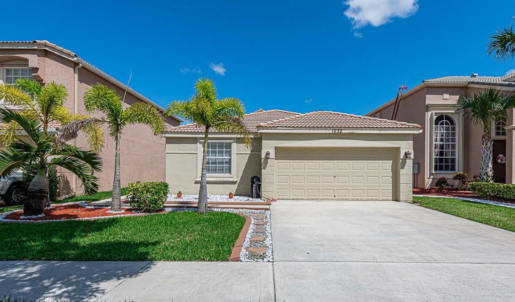 Property Photo:  1232 Oakwater Drive  FL 33411 