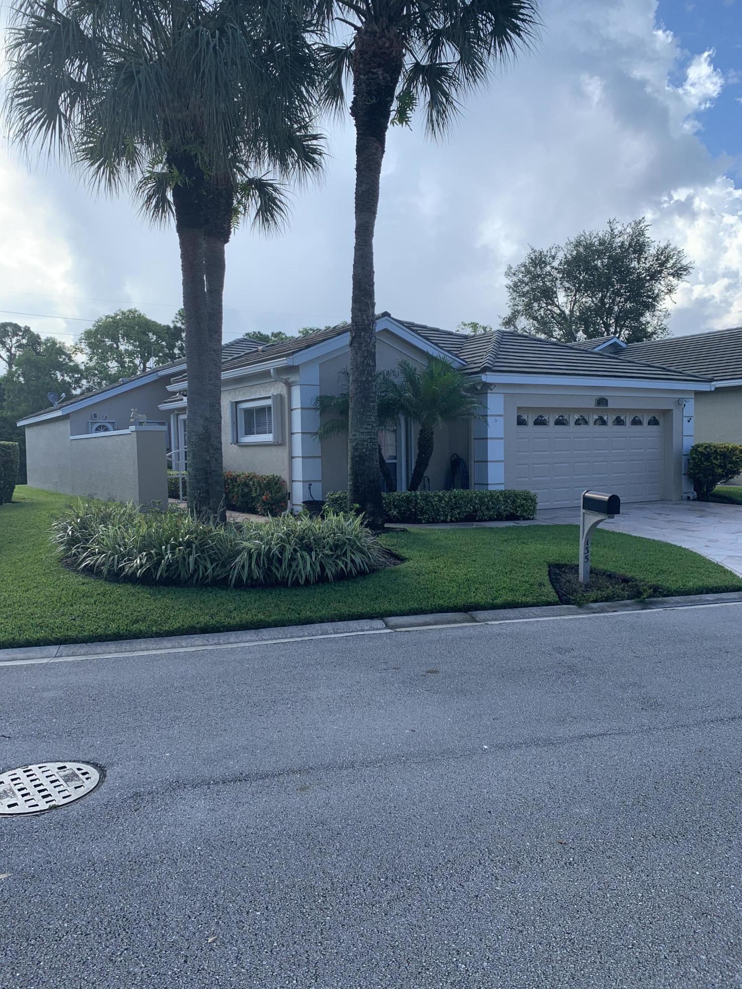 Property Photo: 135 Harbor Lake Circle FL 33413