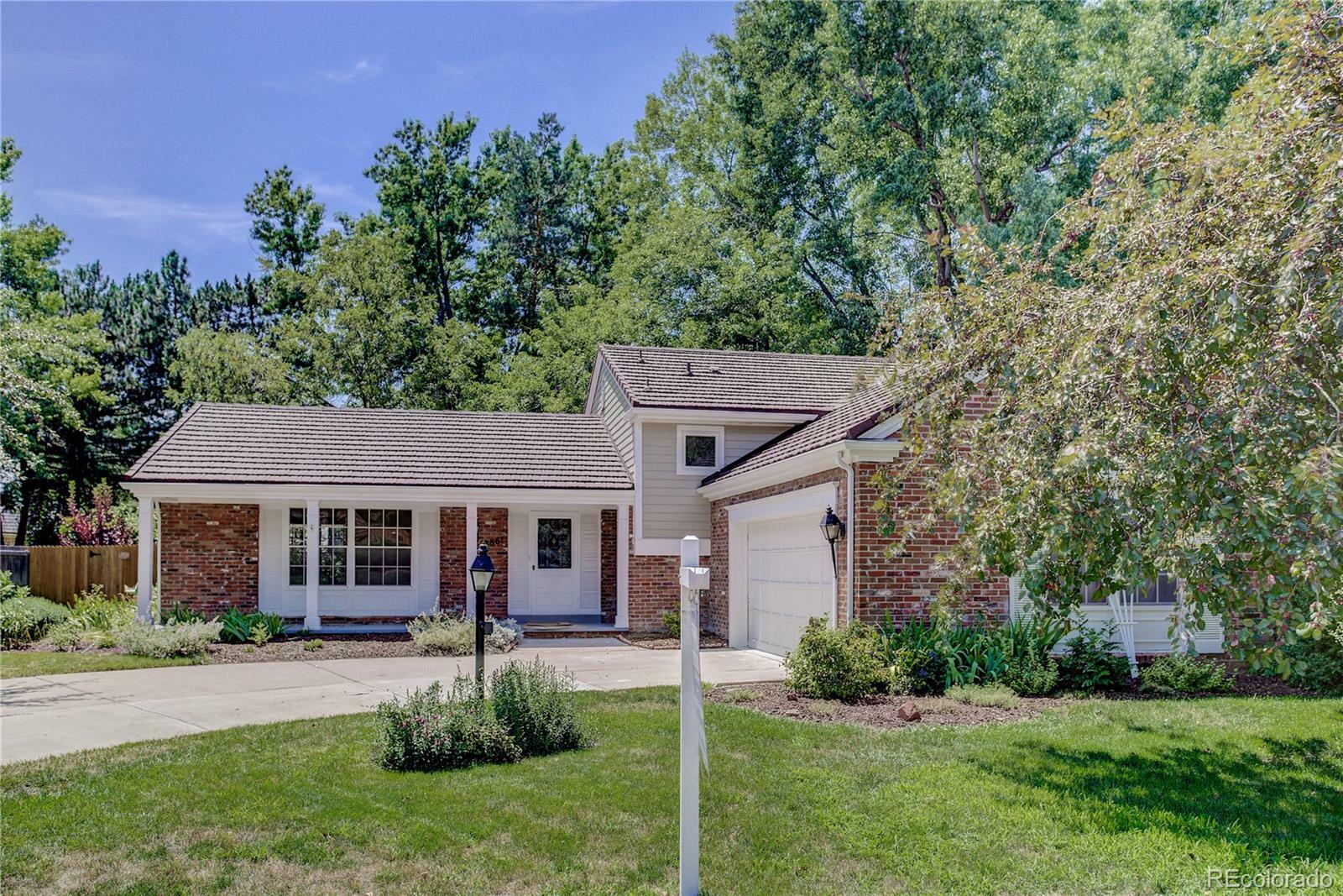Property Photo: 3861 S Narcissus Way CO 80237