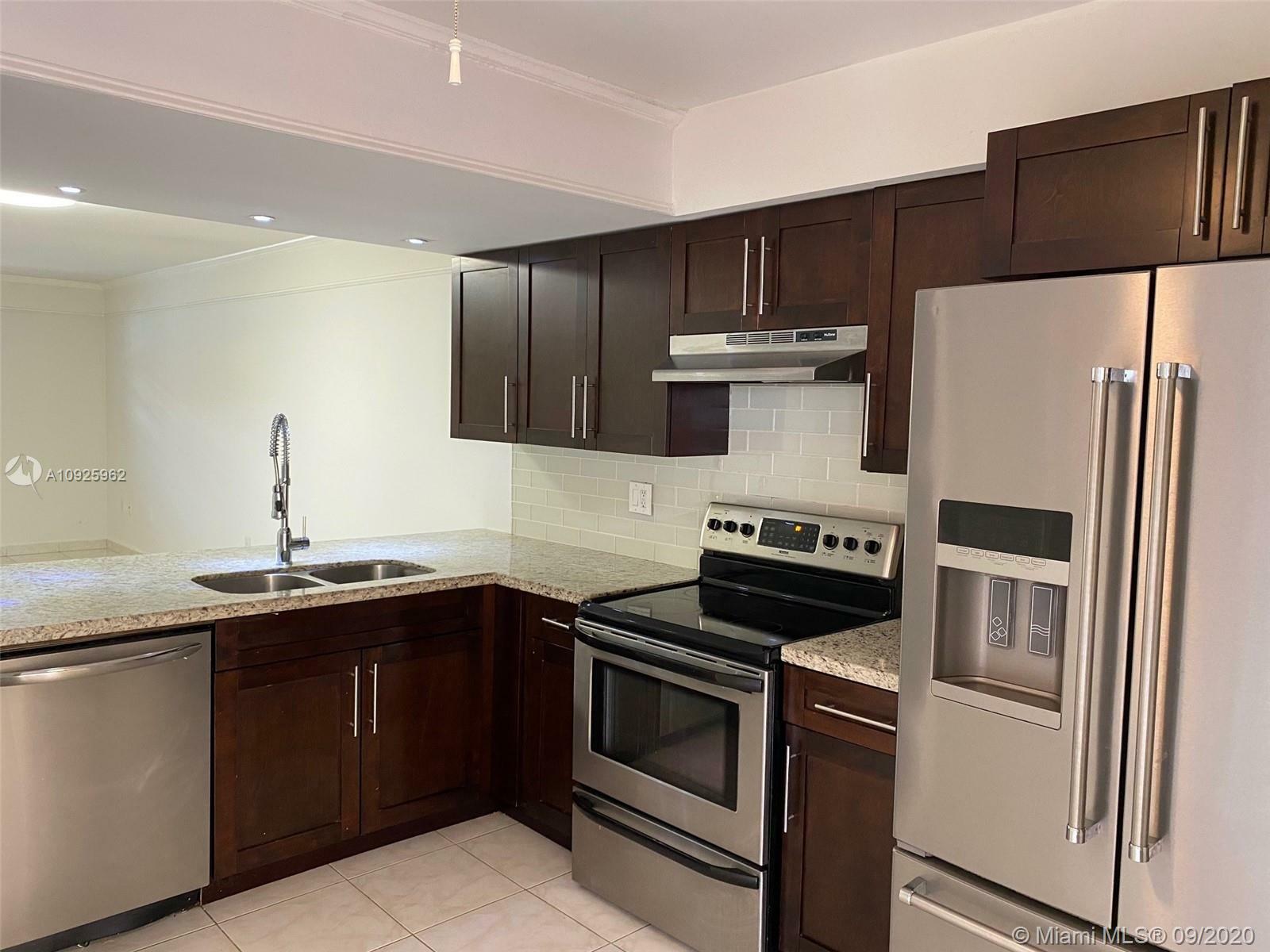 Property Photo: 5111 W 12th Ln C-1 FL 33012