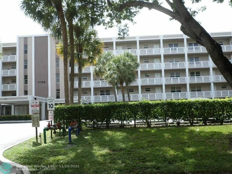 Property Photo:  1100 NW 87th Avenue 202  FL 33071 