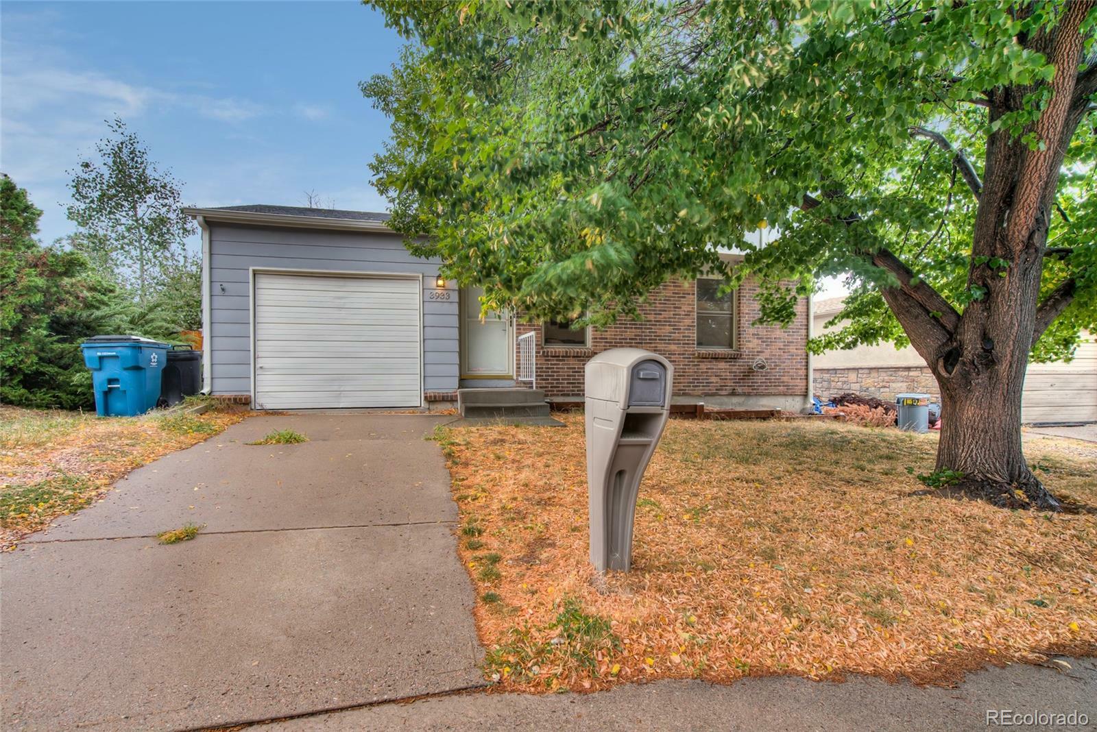 Property Photo:  3933 S Pagosa Street  CO 80013 