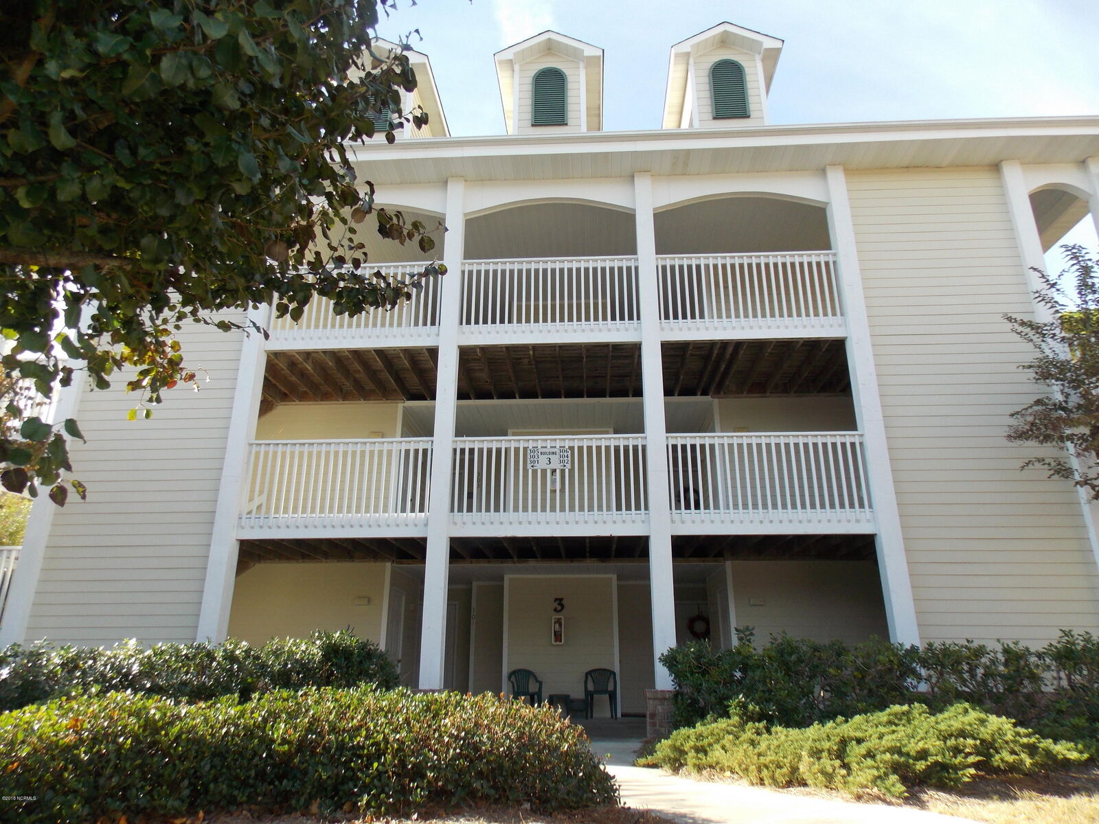 Property Photo:  3350 Club Villa Drive SE 205  NC 28461 