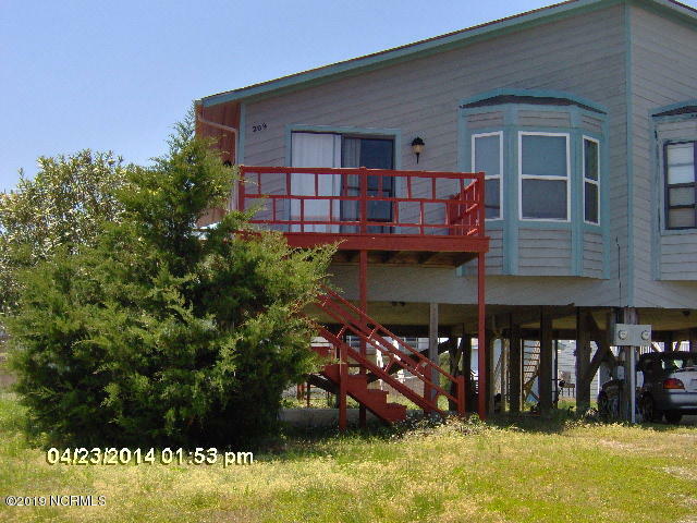 Property Photo:  209 Coastal Drive  NC 28460 