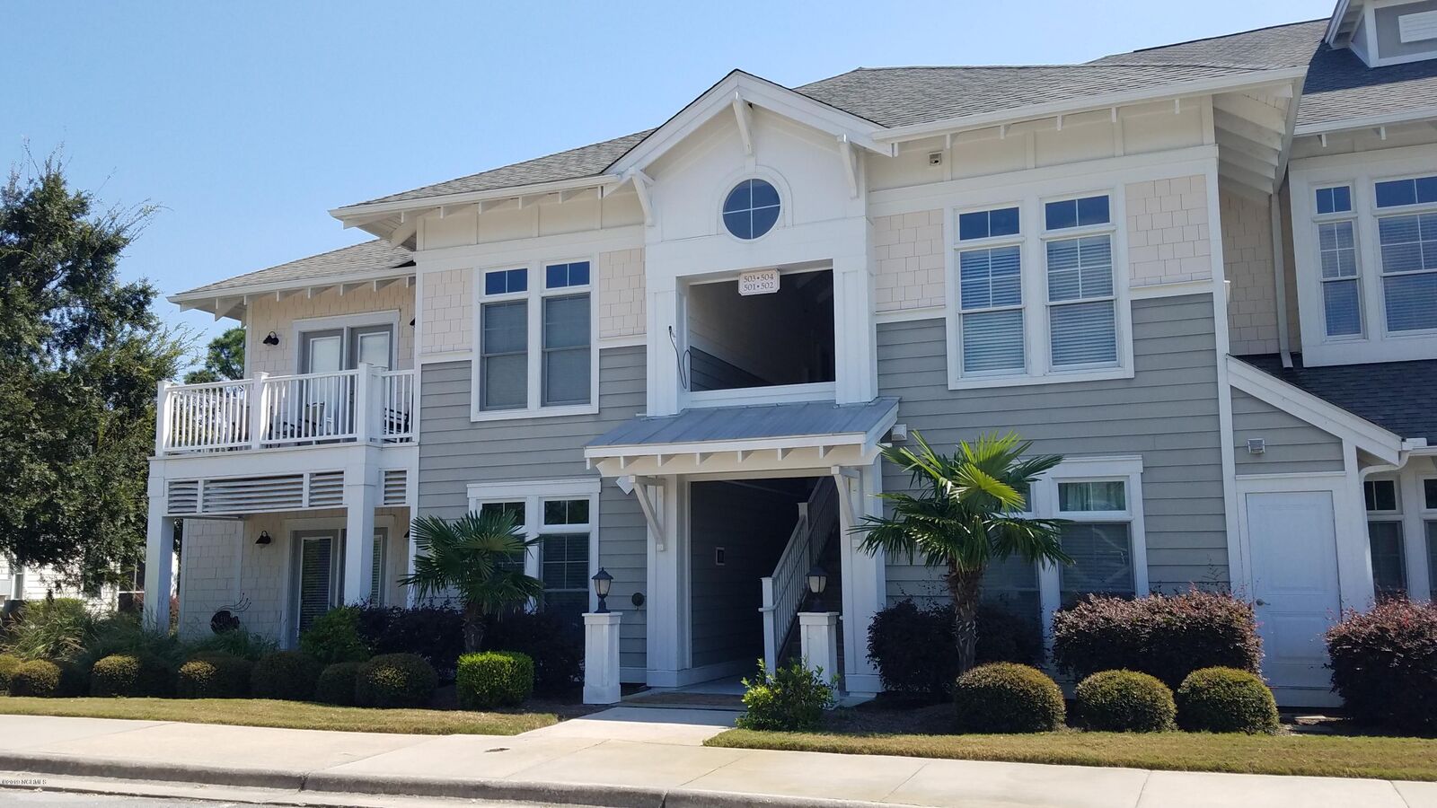 Property Photo:  2537 St James Drive SE 504  NC 28461 