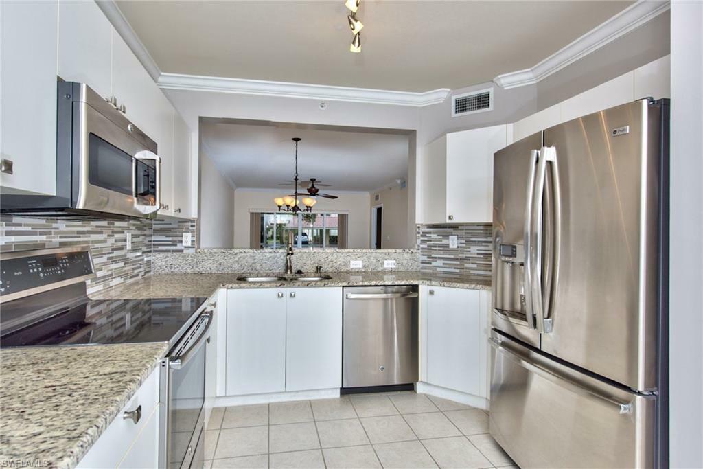 Property Photo: 7821 Great Heron Way 102 FL 34104