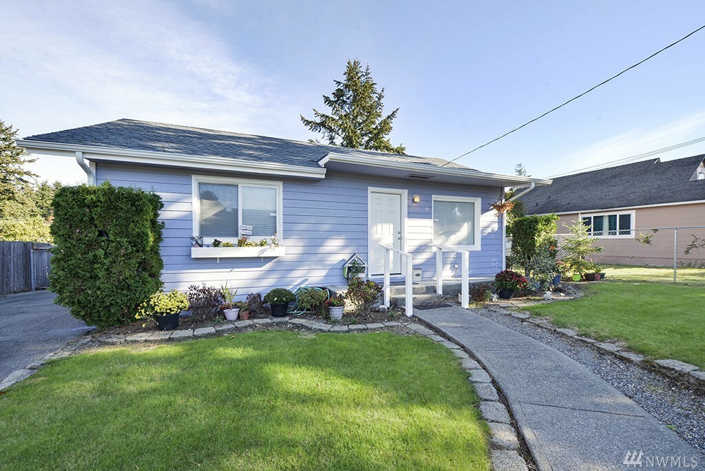 Property Photo: 6607 S Wapato St WA 98409