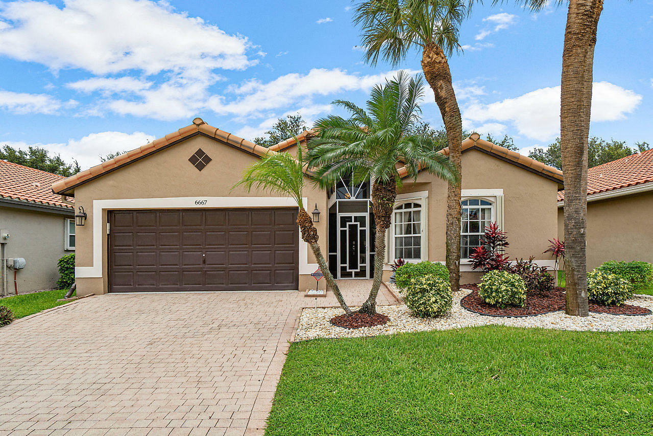 Property Photo:  6667 Sherbrook Drive  FL 33437 