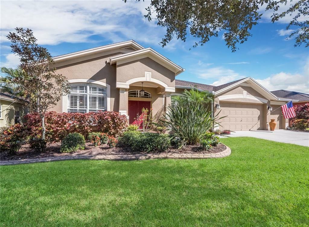 Property Photo: 7314 Carrington Oaks Lane FL 33572