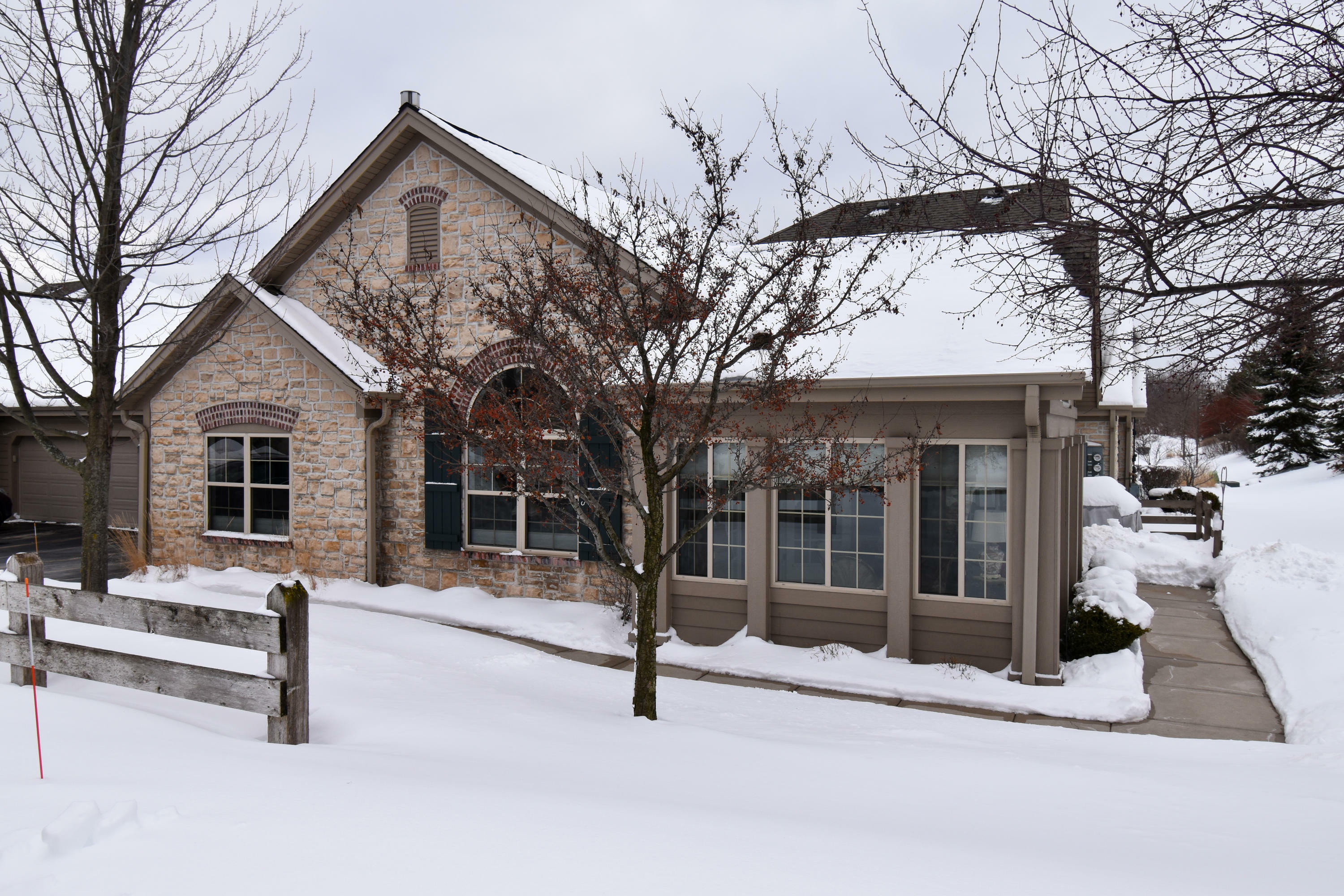 Property Photo:  W155n6957 Macallan Ct 203  WI 53051 