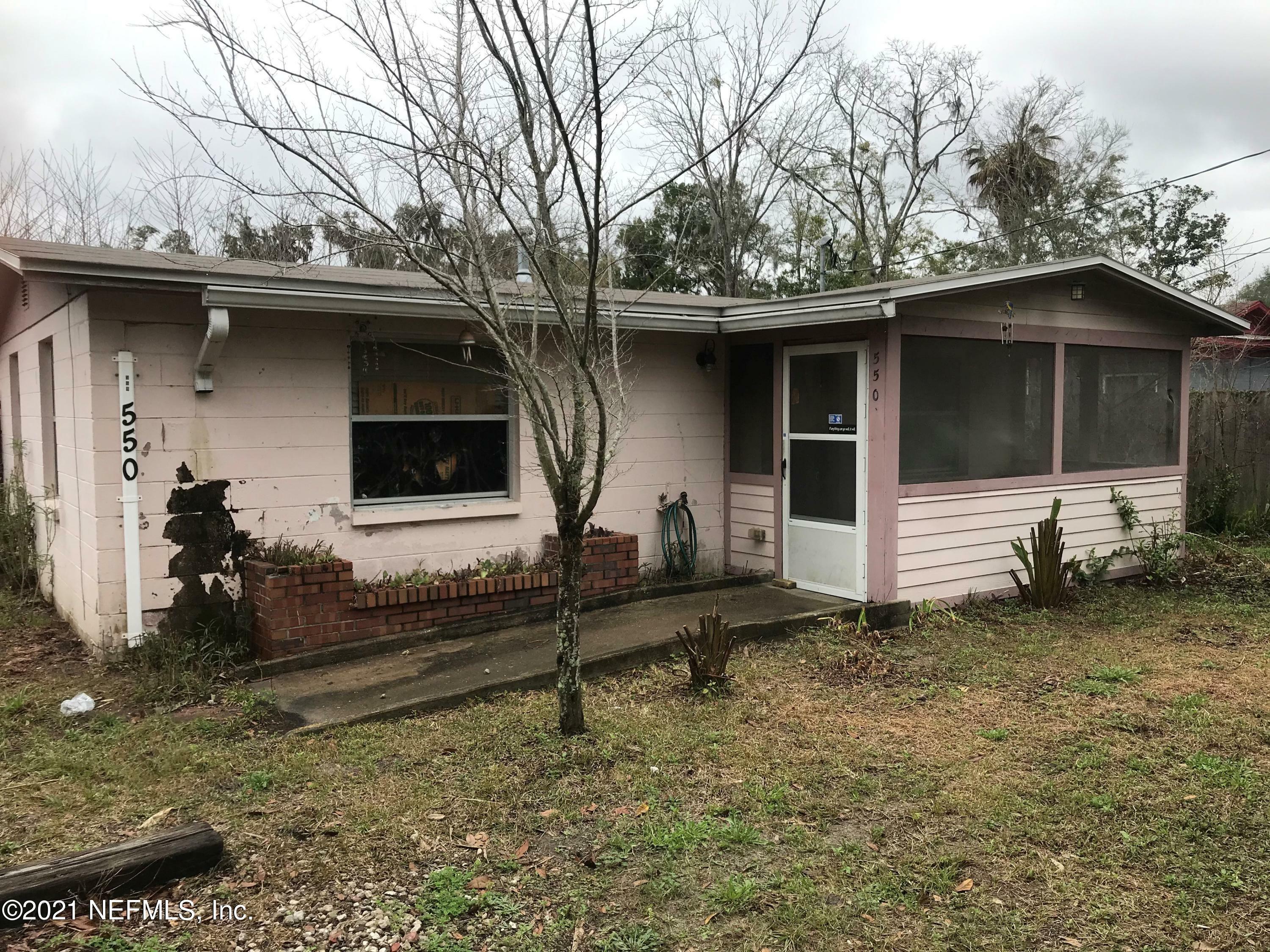 Property Photo:  550 NW 26th Avenue  FL 32609 