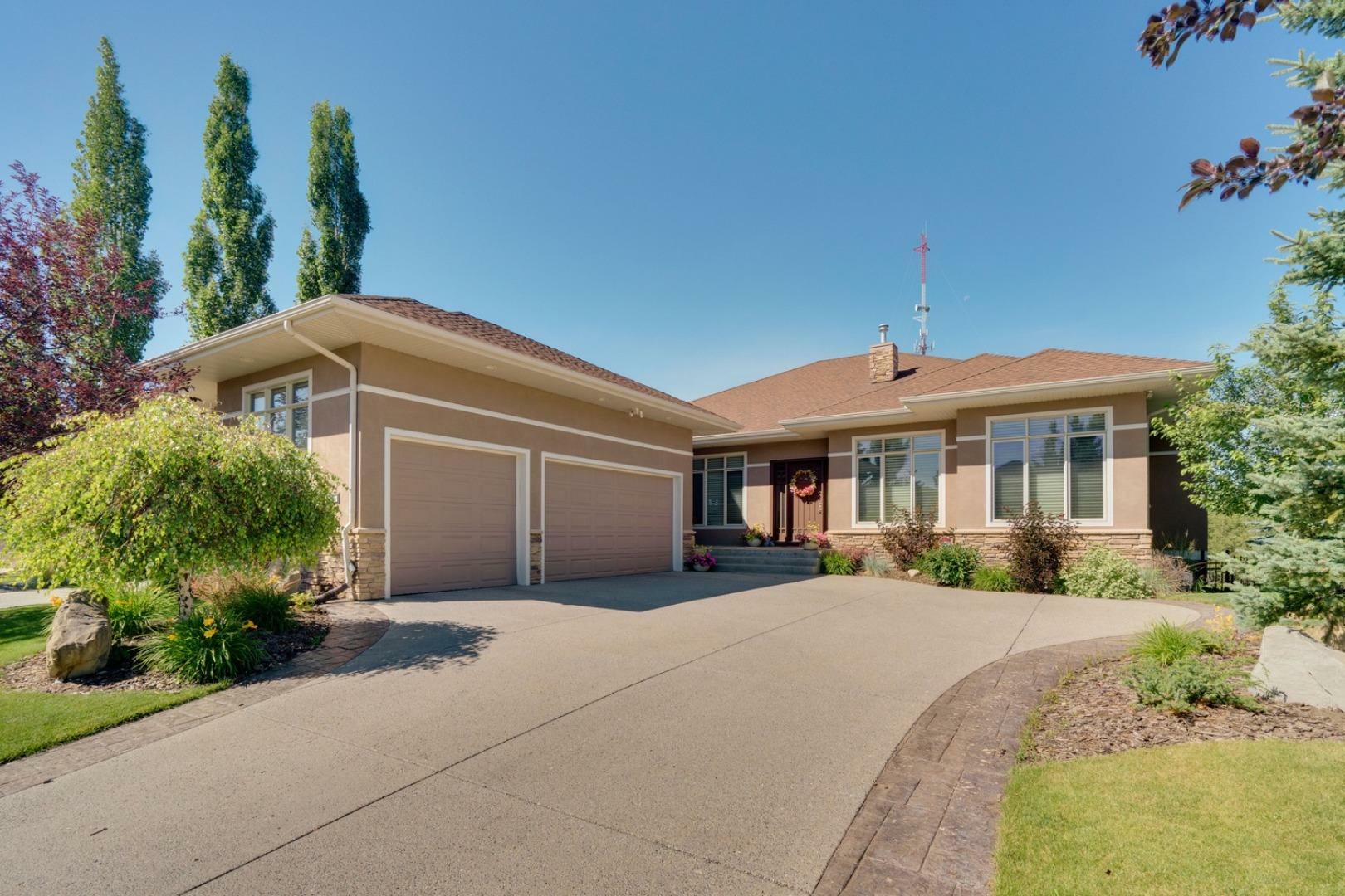Property Photo: 82 Aspen Ridge Way SW AB T3M 5M2