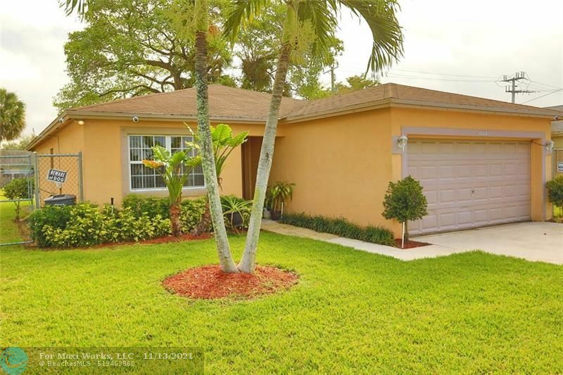 Property Photo:  1060 NW 27th Ave  FL 33069 