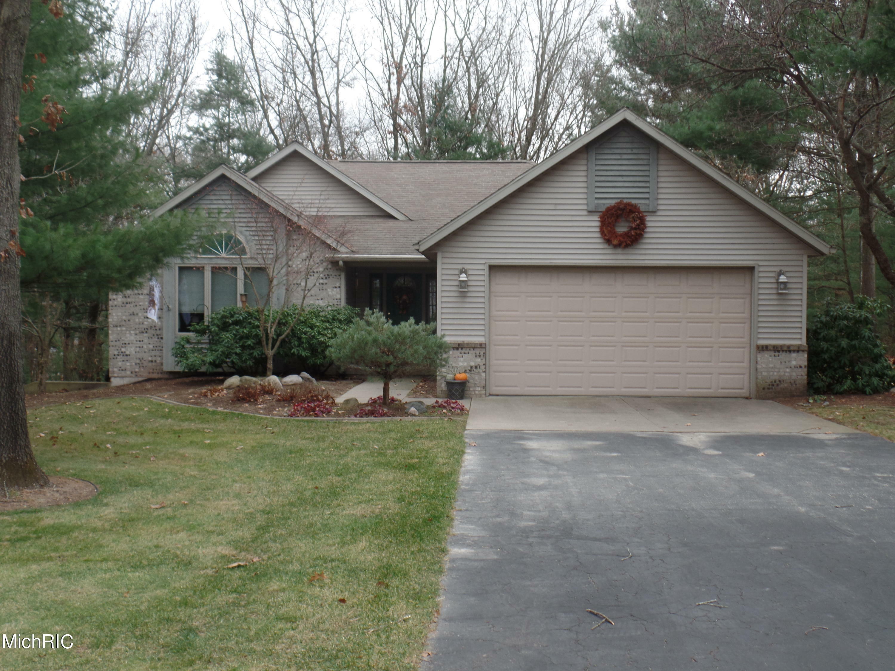 Property Photo:  7093 Timberview Drive  MI 48838 