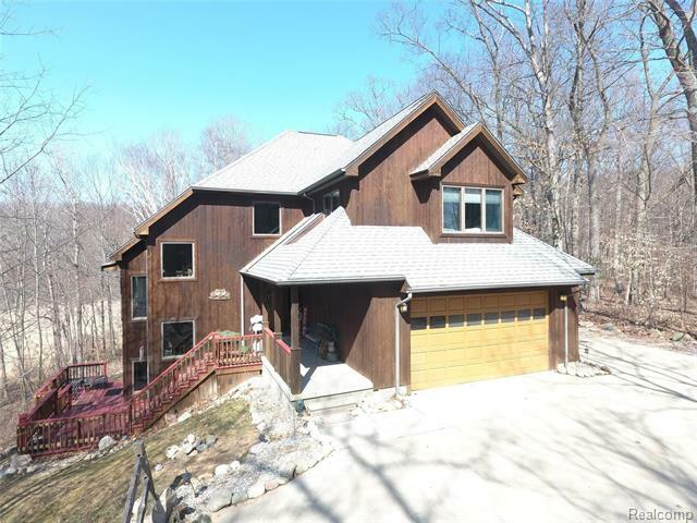 Property Photo: 824 Old Sorrel Drive MI 48446