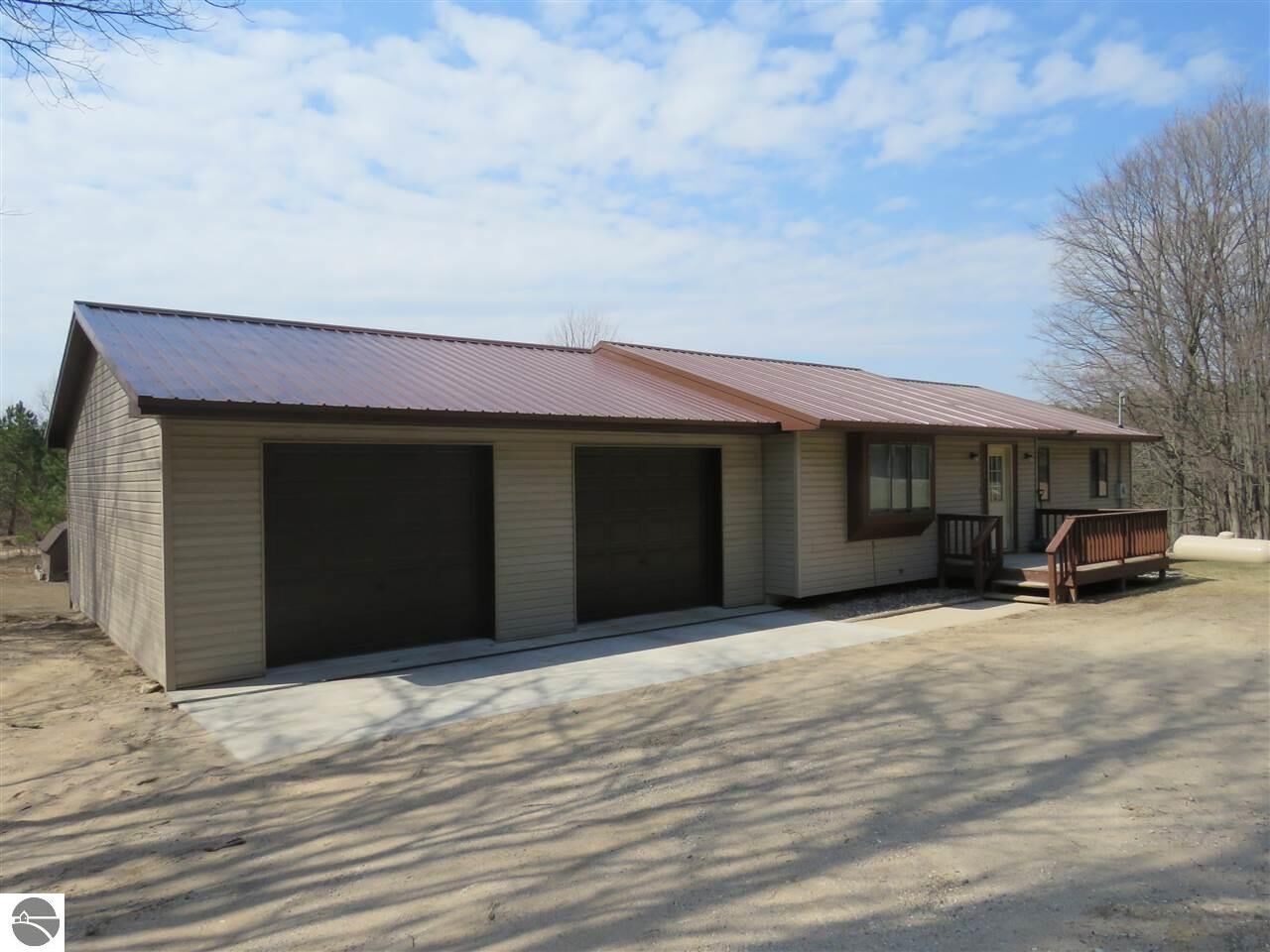 Property Photo:  140 S 21 1/2 Road  MI 49618 