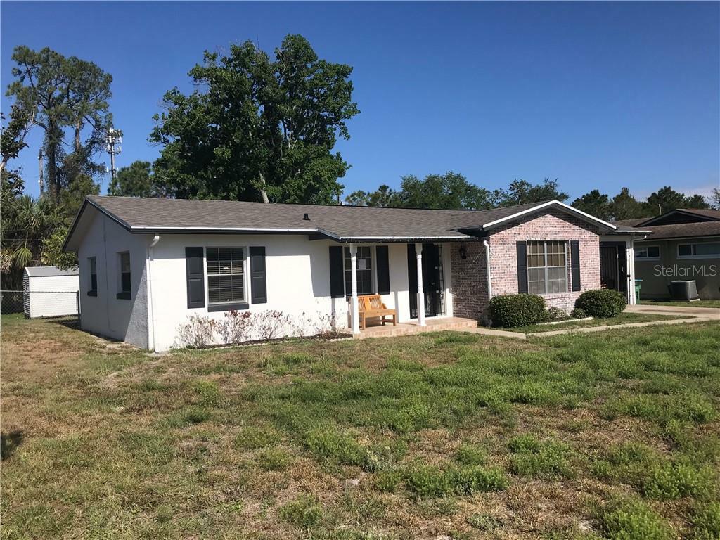 Property Photo: 1024 W Embassy Drive FL 32725